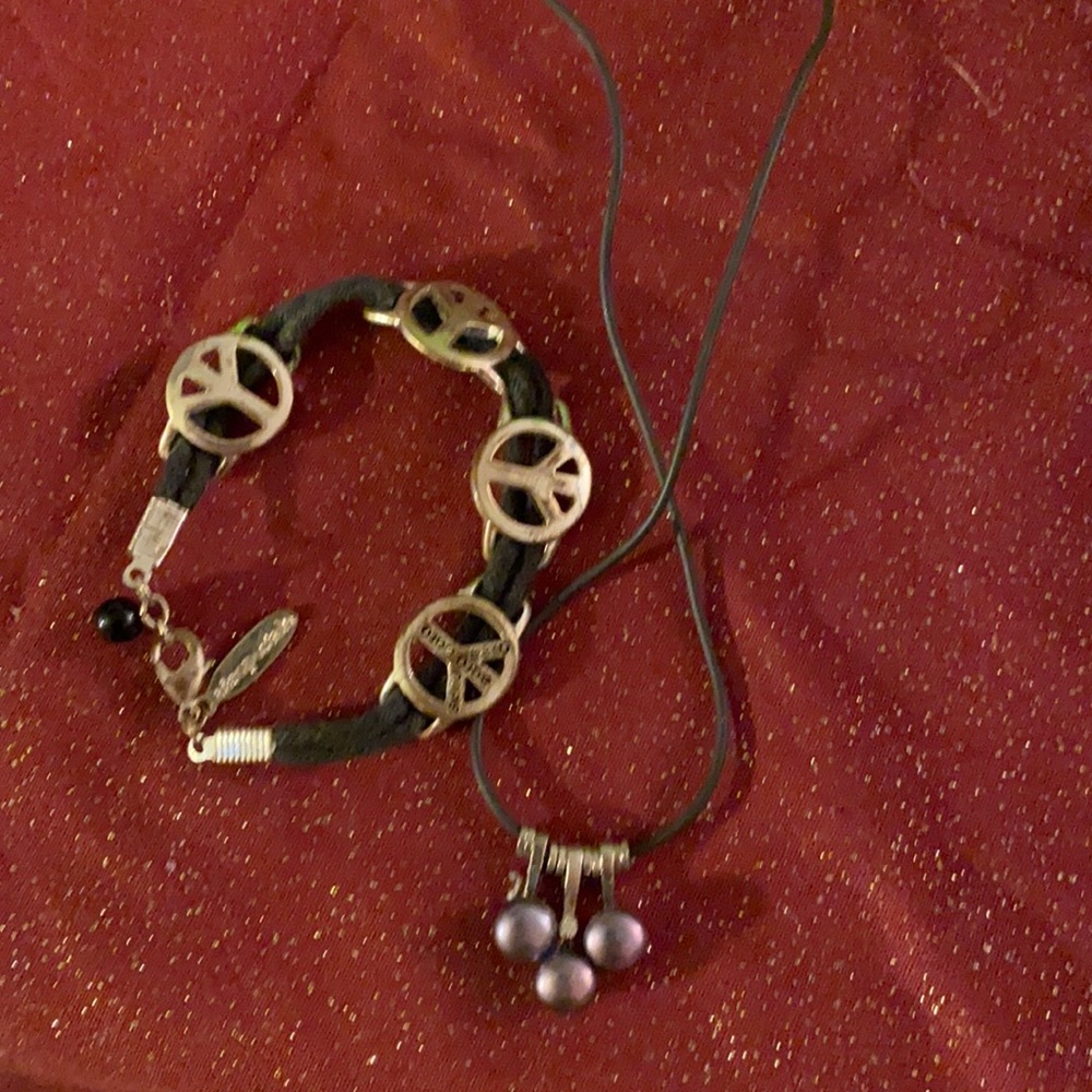 Peace bracelet and corded necklace